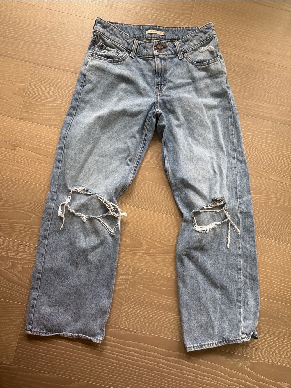 Levi’s Light Blue Distressed Jeans - Superlow Straight Fit